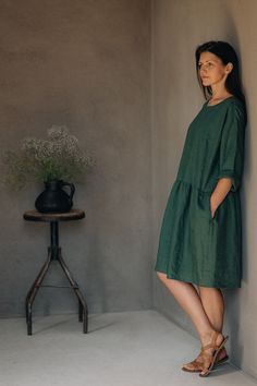 "Handmade in a small family run studio: the dress is handmade with care and attention to detail, emphasizing the craftsmanship and quality. Fabric: The dress is made from high-quality Oeko Tex certified European linen fabrics, offering breathability and comfort. Colors: The dress is available in classic colors, including dark gray, black, dark green, sage green, etc. providing a range of options. Loose-Fitting Design: The loose-fitting design ensures comfort and freedom of movement for everyday wear and special occasions. Stonewashed linen (medium weight 175-205grams)  Long sleeves, wide enough to easy roll them up Hidden side pockets Dress length is about 111 cm / 43.7\" (You can choose other length-please send us a message.) The dress is a loose fit so if you want a more fitted look, ple Etsy Dresses Women, Relaxed Fit Linen Tunic Dress, Green Linen Dress For Daywear, Green Relaxed Fit Linen Dress, Green Linen Daywear Dress, Linen Tunic Midi Dress For Daywear, Relaxed Fit Linen A-line Dress, Green Midi Linen Dress, Midi Linen Dress