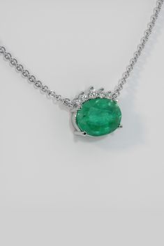 The emerald pendant is a symbol of luxury and sophistication! Give yourself or a loved one a unique piece of jewelry that will emphasize your personality and status. The elegant design, the brilliance of precious stones and the unique charm of the emerald will create a unique image that will not leave anyone indifferent. Treat yourself to a moment of luxury with an emerald pendant Green Oval Necklace For Formal Occasions, Formal Green Oval Necklace, Green Emerald Necklace With Brilliant Cut For Formal Occasions, Classic Oval Emerald Necklace For May Birthstone, Luxury Oval Emerald Necklace, Classic Oval Emerald Gemstone Necklace, Luxury Green Emerald Oval Pendant Necklace, Luxury Oval Emerald Necklace For May Birthstone, Classic Oval Emerald Necklace