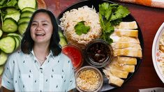 a woman sitting in front of a plate of food with cucumbers and rice