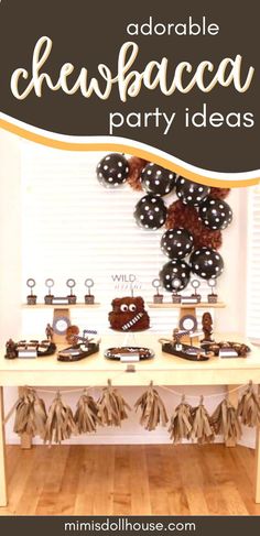 a football themed party with black and white balloons, chocolate decorations and brown paper pom poms