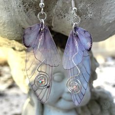 These beautiful dainty pink butterfly wing dangle earrings are the perfect addition to any fairy-inspired or ethereal look. The double wings design adds a touch of whimsy and movement, while the glittered top wing sparkles in the light. These fairy wing earrings feature copper or silver-colored swirled wires embellished with a pink crystal with a luster finish which catches the light in rainbow colors. These butterfly wings have three different ear wire selections to choose from, bare copper, ni Fairytale Jewelry, Fairy Wing Earrings, Butterfly Dangle Earrings, Fairy Tale Jewelry, Disney Princess Drawings, Princess Drawings, Glitter Top, Wings Design, Butterfly Wing