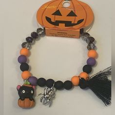 Delight In The Spooky Spirit With This Bewitching Accessory Featuring Silver Spider Charm, Purple And Black Beads, Along With Mysterious Black Clear Beads. Unveil A Touch Of Mystery As You Showcase The Captivating Black Cat Inside A Pumpkin Charm. Perfect For Adding A Dash Of Halloween Magic To Any Outfit. Novelty Black Beaded Bracelets For Halloween, Black Beaded Bracelets For Party In Novelty Style, Playful Black Adjustable Jewelry, Unicorn Glass, Star Wars Shoes, Hello Kitty Earrings, Mickey Mouse Necklace, Dream Bracelet, Hair Gift