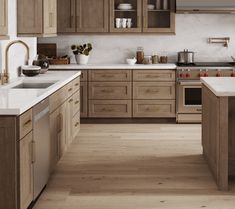 a kitchen with wooden cabinets and white counter tops