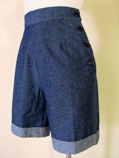 "Handmade denim high waisted  shorts with blue side buttons (you can request other colors) or zipper! Made from soft denim fabric in classic dark blue! I can make it in your exact measurements and in a big variety of f denim fabrics.Just pm and i will send pics! Pockets,belt loops,straps etc can be made upon request and will charge accordingly ! I will need your your measurements for waist and hips! Inseam for shorts is usually 4.5\"-5\" and 15.5\"-16\" for the pedal pushers.You can pm me if you 1950s Shorts, Vintage High Waisted Shorts, Pedal Pushers, Retro Shorts, 1950s Style, High Waisted Shorts Denim, Denim Shorts Women, 50s Fashion, 1950s Fashion