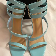 Shoedazzle | Petite Four Blue Spiral-Strap Ronja Sandal - Women Size 12: New In Box Contemporary Take On The Classic Sunny Day Stepper Featuring An Elevated, Slim Heel And An Ankle-Encircling, Spiral Shaft. Features Shoe Dazzle Dream Sole Provides Double The Padding For Comfort, Support And Ease Of Movement Product Details 4.25'' Heel Slip-On Man-Made Upper Man-Made Lining Man-Made Footbed Man-Made Sole Imported Blue Strappy Sandals For Spring, Blue Strappy Sandals For Formal Occasions, Blue Strappy Sandals For Party, Blue Strappy Sandals For Evening, Trendy Blue Strappy Sandals, Blue Strap Sandals For Spring, Blue Strappy Evening Sandals, Chic Blue Strappy Heels, Blue Open Toe T-strap Sandals For Spring