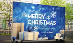 a large blue christmas sign with presents on it