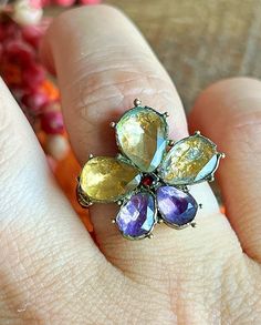 Antique Georgian Sentimental Pansy Ring With Back Foiled Amethysts, Citrines and Garnet - Etsy Multicolor Amethyst Gemstone Ring, Heirloom Multi-stone Amethyst Ring, Unique Multi-stone Gold Amethyst Ring, Unique Gold Multi-stone Amethyst Ring, Multicolor Multi-stone Amethyst Ring Gift, Vintage Flower-shaped Multi-stone Jewelry, Multicolor Rose Cut Diamond Jewelry Gift, Gift Jewelry With Multicolor Rose Cut Diamonds, Yellow Gold Multi-stone Amethyst Ring Gift