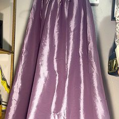 Skirt Is Made Of Bridal Satin, Pleated In Front While Sheered At The Back, Very Versatile As It Can Be Worn Day And Night, Formal Or Cocktail Party, Indoor Or Garden Party, Fits From Small To Xl. Elegant Purple Full Skirt Bottoms, Elegant Full Skirt In Purple, Purple Satin Skirt For Party, Elegant Full Purple Skirt, Elegant Purple Satin Bottoms, Purple Elegant Relaxed Fit Maxi Skirt, Purple Party Maxi Skirt, Purple Satin Party Skirt, Elegant Purple Relaxed Maxi Skirt