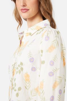 Australian floral bottle brush printed button down women’s shirt. Long sleeve style with pointed collar, made of cotton for a springtime cottage vibe- button up front with sweet pointed collar - relaxed fit through body - full length sleeve with button cuff - made of smooth cotton - available in cream Product Code: PGFY015 Relaxed Fit Floral Print Button-up Blouse, Spring Patterned Shirt With Relaxed Fit, Feminine Floral Print Button-up Shirt, Casual Spring Blouse With Plant Print, White Collared Blouse With Floral Print, Patterned Relaxed Fit Shirt For Spring, Floral Print Long Sleeve Blouse For Garden Party, Patterned Shirt With Relaxed Fit For Spring, Relaxed Fit Patterned Shirt For Spring