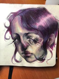 a drawing of a woman's face with purple hair