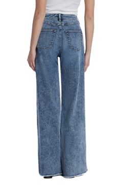 Raw hems refresh the retro style of elongating wide-leg jeans crafted from faded low-stretch denim. 32" inseam; 23" leg opening; 10 1/4" front rise Zip fly with button closure Five-pocket style 67% cotton, 27% REPREVE® recycled polyester, 5% rayon, 1% spandex REPREVE recycled polyester is made from 100% post-consumer recycled plastic bottles Machine wash, tumble dry Imported Acid Wash Denim Mid-rise Bottoms, High Rise Washed Cropped Denim Jeans, Trendy Medium Wash Flare Jeans With Five Pockets, Washed Denim Blue Cropped Flare Jeans, Dark Wash Full Length Denim Flare Jeans, Denim Blue Washed Cropped Flare Jeans, Faded Wide Leg Washed Flare Jeans, Summer Faded Denim Flare Jeans, Denim Wide Leg Pants With Five Pockets