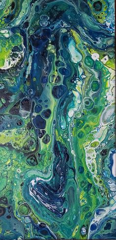 an abstract painting with blue, green and white colors on it's surface is shown