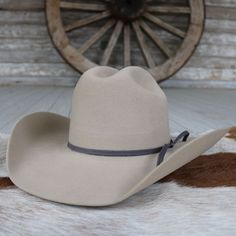 The Youth Wool Hat by M & F Western Products is made from sturdy wool felt and boasts a stylish natural color with a traditional black hatband. Its stretch-to-fit band guarantees a snug and comfortable fit, making this hat a vital piece for your child's western attire, offering both durability and style for every rodeo and horseback riding adventure. Brim 4" Crown 4-1/2" Color - Natural Premium Wool Blend Medium - 53 CM, Large - 54 CM, X-Large - 56 CM Little Cowboy, The Youth, Western Hats, Stretch Bands, M F, Hat Band, Wool Hat, Cowboy Hat, Horseback Riding