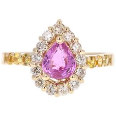 Cute Pink Sapphire and Diamond Ring! Can be an everyday ring or a unique Engagement Ring! This beautiful ring has a Pear Cut Pink Sapphire that weights 1.11 Carats. The ring is embellished with 14 Round Cut Diamonds that weigh 0.41 Carats with a clarity and color of VS/H as well as 6 Yellow Sapphires on the shank of the ring weighing 0.28 Carats. The total carat weight of the ring is 1.80 Carats. The ring is beautifully set in 14K Yellow Gold with an approximate weight of 3.3 grams. It is a size Gia Certified Fine Jewelry Pink Sapphire Diamond Ring, Fine Jewelry Gia Certified Pink Sapphire Diamond Ring, Gia Certified Pink Sapphire Diamond Ring In Fine Jewelry, Gia Certified Pink Sapphire Diamond Ring, Gia Certified Yellow Gold Cluster Ring, Yellow Gold Cluster Sapphire Ring With Brilliant Cut, Fine Jewelry Pink Sapphire Diamond Ring With Multi-stones, Yellow Gold Sapphire Cluster Ring With Brilliant Cut, Yellow Gold Cluster Sapphire Ring With Center Stone