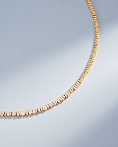 Handcrafted from 18-karat gold, our baguette diamond tennis necklace is a must-have for any jewelry collection. Its timeless design is perfect for both day and night, adding a touch of elegance to any outfit. Whether worn alone or layered with other tennis necklaces, this piece is sure to become an instant favorite. Details 18k yellow gold, rose gold or white gold 3.75 carats of white diamond baguettes Necklace measures 17" inches in length Box clasp with safety lock fastening 3.6mm width Ref: B Gold Baguette Diamond Tennis Necklace Gift, Gold Tennis Necklace With Baguette Diamonds, Gold Necklace With Baguette Diamonds, Elegant Gold Tennis Necklace With Baguette Diamonds, Elegant Tennis Necklace With Baguette Diamonds As Gift, Cubic Zirconia Tennis Necklace With Baguette Cut Diamonds, Elegant Baguette Diamond Tennis Necklace Gift, Tennis Necklace With Baguette Diamonds As A Gift, Modern Gold Diamond Necklace With Baguette Diamonds