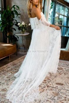 This off the shoulder wedding gown is truly timeless elegance! Made with a premium stretch material and lace ruffle and train, this gown is equally stunning and comfortable. This is a gorgeous pregnancy wedding dress that will have all eyes on you! Content + Care Neckline: Off-the-shoulder. Pattern Type: Solid. Sleeve: Short Sleeves. Season: Spring, Summer, Fall, Winter. Material: Lace. Hand Wash Cold, No Bleach, Hang or Line Dry Size + Fit Length: Floor(72''-based on size M). Casual, Photoshoot White Lace Maternity Wedding Dress, White Lace Maternity Dress For Wedding, Elegant Wedding Maternity Dress With Lace Trim, Elegant Maternity Wedding Dress With Lace Trim, Fitted Maternity Wedding Dress With Sweep Train, Fitted Maternity Dress With Sweep Train For Wedding, Fitted Off-shoulder Maternity Dress For Wedding, Wedding Maternity Dress With Lace Bodice, Maternity Wedding Dress With Lace Bodice