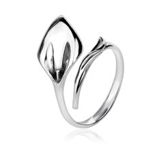 Calla Lily ring made of a Sterling Silver .925 Modern twist look. The design of the ring is made to be easily adjustable and to fit most fingers. Great gift choice for any occasions. Ring Size - Adjustable size, you can adjust the ring size from US5 to US8. Weight - approx. 2 - 3 gr. The item is stamped/marked .925! 100% guaranteed quality. Real images. As this can be seen at the Photos. NOTE: Due to the difference device/monitors being used, pictures may not reflect the actual colour of the item. Copyright infringement is prohibited! Work only in sterling silver, not in chrome plated pewter. Do not hesitate to contact us if you need further help or have a questions. Adjustable Open Flower Ring In White Gold, Adjustable White Gold Flower Open Ring, Adjustable White Gold Open Flower Ring, Elegant Adjustable Sterling Silver Flower Ring, White Gold Open Flower Ring, Lily Ring, Fox Ring, Real Images, Stackable Jewelry