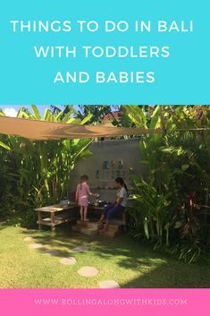 two children sitting at a picnic table with text overlay that reads things to do in bali with toddlers and babies