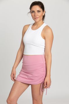 75% Nylon, 25% Spandex Built-In Spandex Shorts Adjustable Length, Drawstring Side Ties Model Details: Modeled in size: Small, Small Model Bust: 34, 32 Model Waist: 27, 25 Model Height: 5'9, 5'9 Fitted Tiered Mini Skirt With Built-in Shorts, Versatile Gathered Skirt, White Tiered Skirt With Drawstring, Fitted Tiered Skort With Built-in Shorts, Stretch Ruched Skort, White Stretch Skirt With Ruched Details, Versatile Fitted Gathered Skirt, Versatile Stretch Gathered Skirt Bottoms, Versatile Stretch Gathered Skirt