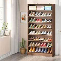 a wooden shoe rack filled with lots of shoes