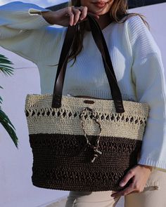 Brown straw bag - perfect for all your summer adventures! 🏖️🌞 Handcrafted with care and excellence, this oversized Beach Bag is your new must-have accessory to carry all your essentials in style.   Our summer tote bag is crafted from high-quality paper yarn, ensuring it's both durable and eco-friendly. With its elegant crochet pattern, this raffia bag is the perfect combination of fashion and function, making it one of the best beach bags on the market today! 🌿👜 🛍️ Large shoulder bag - Designed with a comfortable and sturdy strap, this bag is easy to carry over the shoulder, providing hands-free convenience while shopping, strolling along the beach, or exploring local markets during your vacation.  🔒 Zipper beach bag - The zip-top closure ensures your belongings are safely secured, s Summer Satchel Hobo Bag For Travel, Summer Travel Satchel Hobo Bag, Casual Vacation Bags With Leather Handles, Casual Bags With Leather Handles For Vacation, Brown Beach Bag With Braided Handles For Vacation, Vacation Beach Bag With Brown Braided Handles, Vacation Beach Bag With Braided Handles In Brown, Brown Bag With Adjustable Strap For Beach Season, Brown Pouch Shoulder Bag For Beach Season