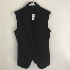 Dressy Black Vest From Express Black Vest For Business Casual Fall Season, Classic Black Blazer For Night Out, Black Vest For Business Casual Spring, Black Vest For Business Casual In Spring, Black Business Vest For Fall, Black Business Vest For Spring, Black Winter Vest For Night Out, Fitted Black Outerwear For Business Casual, Casual Fitted Black Blazer