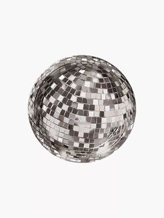 a mirror ball is shown in the middle of a white background with black and silver squares