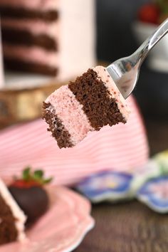 a piece of cake being held by a fork