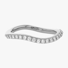 a white gold wedding band with round brilliant cut diamonds on the bottom and an elegant curved design