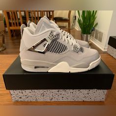 Brand New, Women's Air Jordan 4 Retro 'Frozen Moments' In Size 6.5. 100% Authentic And Comes With Original Box. Purchased Directly From Nike Ca. Sold Out Online! The Women’s Air Jordan 4 Retro ‘Frozen Moments’ Features A Pale Grey Suede Upper With A Color-Matched Forefoot Overlay In Glossy Leather. Breathable Netting Is Utilized On The Throat And Quarter Panel, While The Shoe’s Molded Eyelets And Support Wings Shine In A Metallic Silver Finish. Tonal Jumpman Branding Embellishes The Tongue And M Air Jordan 4 Women, Shoes List, Air Jordan 1 Women, Nike Shoes Girls, Shoes Retro