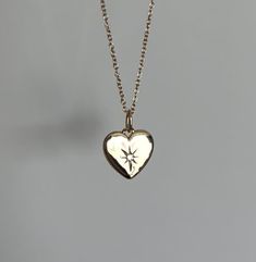 "Cute Heart Necklace w/ Star Detail! -------------- - CHOICE OF SILVER OR GOLD PLATED SILVER - Perfect for layering! - Waterproof! -------------- - 925 Sterling Silver  - Rhodium Plated (18kt Gold Plated) - 16'' chain + 1\" extension  - Hypo-allergenic - Pendant is 13x13mm -------------- - All components are solid 925 sterling silver (not plated or filled) - FREE SHIPPING across Canada - Product Care instructions included in package" Small Heart Necklace, Hand Cuff Bracelet, Heart Charm Necklace, Sterling Silver Heart Necklace, Silver Bow, Silver Heart Necklace, Cute Heart, Sterling Silver Cross, Silver Cross