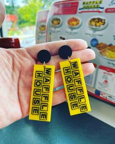 "Waffle House logo earrings for the true waffle lover! You have got to wear these if you are ordering yourself an All Star Special on a Saturday morning in Atlanta. They are super light weight, made from 1/8\" acrylic. The stud back is 3/4\" in diameter. The Waffle House logo is just shy of 2 1/4\" long and an inch wide. A true statement size earring! They come standard on hypo-allergenic stainless steel posts that are free from lead and nickel. However, if you have super sensitive ears and need House Earrings, Generation Dolls, Waffle House, Our Generation Dolls, House Logo, Our Generation, Home Logo, Saturday Morning, Sensitive Ears