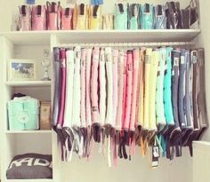 the closet is filled with many different colored items