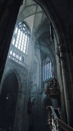 the interior of an old church with large windows