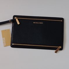 Michael Kors Mercer Large Travel Wristlet Leather Admiral Color New 6"H X 9.5"L Inch Strap 5"Inch Easy To Carry Wristlet For Essentials For Events Like Wedding, Bridal Shower, Special Events Wristlet For Everyday Wristlet Travel Convenient To Put Passport, Wallet Or Documents Inside Great For Gifts Lightweight Organizer For Bags So Stuff Is Not All Over The Place Handheld Clutch With Gold-tone Hardware For Travel, Formal Clutch Wristlet With Zipper Closure, Michael Kors Clutch With Zipper For Everyday Use, Michael Kors Clutch With Zipper Closure, Michael Kors Rectangular Everyday Clutch, Everyday Michael Kors Rectangular Clutch, Michael Kors Rectangular Clutch For Travel, Elegant Michael Kors Clutch For Travel, Sequin Purse