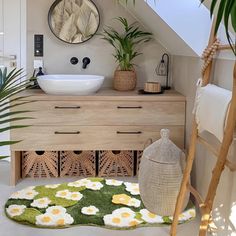 a bathroom with a rug, sink and mirror