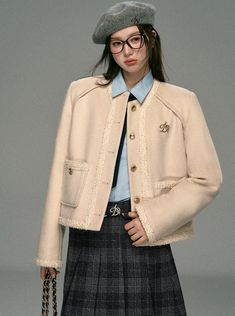 Elevate your wardrobe with our Classic Tweed Cropped Jacket. This beige button-front blazer boasts frayed edges and a sophisticated gold logo pin. Made from high-quality tweed fabric, it exudes elegance and adds a touch of luxury to your outfits. Stay stylish and professional with this timeless piece.  Model info: Height: 166 cm, Weight: 45 kg, Size worn: S Preppy Core, Tweed Jacket Outfit, Tweed Cropped Jacket, Logo Pin, Jacket Beige, Jumpsuit Jacket, Tweed Fabric, Woolen Coat, 5 S