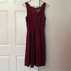 Modcloth Dress Size 2 Wool Blend Sleeveless Swing Dress. Lined, With Flared Skirt And Hidden Pockets. Wine/Maroon Color, Missing Belt. Back Zipper With Hook And Eye Closure. Dress: 50% Wool, 30% Polyester, 20% Rayon Lining: Polyester. Good Condition, Never Worn, Just Kept In The Closet. Shoulder To Hem: 41” Bust: 32” Waist: 26” Hips: Free Sleeveless Burgundy Dress For Spring, Burgundy Sleeveless Dress For Spring, Chic Sleeveless Burgundy Dress, Chic Burgundy Sleeveless Midi Dress, Chic Burgundy Sleeveless Dress, Casual Burgundy Sleeveless Dress, Burgundy Sleeveless Summer Dress, Mod Cloth Dresses, Modcloth Dresses