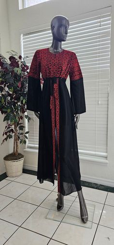 Size : 2 Fits Small Size the best Long Sleeves  Long abaya 56.5" Inches Bust: 38" Inches Shoulders: 16" Inches Embroidered Palestinian Jordanian Black Chiffon open (Zipper Closure from the top) with red embroidery / Tatreez  abaya / Kaftan / Thobe / Dress , Back and Half embroidered Sleeves (Comes with beautiful embroidered belt) Basic information: high quality Arab embroidered chiffon Black base Abaya with red tatreez Condition : NEW Price : 85$ Shipping : Free with USPS Priority Mail Shipping Traditional Long Sleeve Abaya With Embroidered Border, Traditional Long Sleeve Embroidered Abaya, Traditional Red Embroidered Abaya, Traditional Red Embroidered Thobe, Traditional Embroidered Red Abaya, Traditional Red Maxi Length Abaya, Fitted Traditional Black Abaya, Red Embroidered Long Abaya, Red Embroidered Long Sleeve Abaya