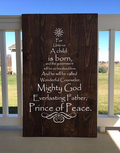 a wooden sign that says, for unto a child is born and the government will be called mighty god everlasting father prince of peace