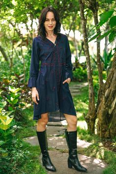 Maroon flowers bloom profusely on a background of navy blue in this pretty high-low shirtdress from designer Shalabh in India. Artisans craft the long-sleeved dress of 100% cotton, and cover the front with traditional chikankari embroidery blossoms. An embroidered button placket and waistline further accent the dress. Maroon Flowers, Embroidered Caftan, Embellished Clothing, Shirtwaist Dress, Cotton Shirt Dress, Flowers Bloom, Embroidered Clothes, Embroidery Fashion, Embellished Dress