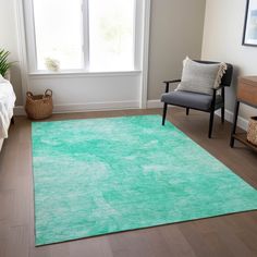 a living room with a chair, rug and window