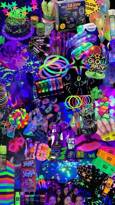 a large assortment of neon colored items on a black background with stars and glow stickers all over it