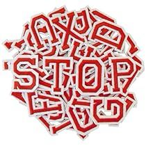 red and white stickers with the word stop written in it's center surrounded by smaller letters