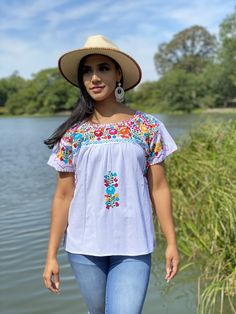 This Beautiful Hand embroidered blouse has a unique and Mexican inspired Floral design. The blouse is a fresh linen embroidered with cotton string by a Mexican Artisan. Note: Shoes and Jewelry modeled may be purchased here: Shoes: https://www.etsy.com/es/listing/828873953/zapato-artesanal-de-plataforma-zapato?ref=listings_manager_grid Filigrana Earrings: https://www.etsy.com/es/listing/637147293/filigrana-redonda-filigrana-clasica?ref=listings_manager_grid Summer Cotton Peasant Top With Intricate Embroidery, White Cotton Festival Peasant Top, White Cotton Peasant Top For Festival, White Folk Style Peasant Top For Vacation, White Folk Peasant Top For Vacation, Embroidered Folk Blouse For Beach, Embroidered Cotton Blouse For Beach, White Peasant Embroidered Top With Embroidered Border, Folk Embroidered Beach Blouse