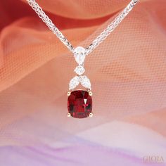 Spinel Pendant Captivating vision of a mesmerising vivid red spinel centrepiece. Fanciful inverted pear-shaped diamond dangle, connected to round brilliance with split marquise complement the stunning spinel gem. Beauty and artistry intertwine in perfect harmony. Spinel the birthstone for the month of August!https://gioia.com.sg/spinel/ #gioiafinejewellery #finejewellery #jewellery #bespokejewellery #customjewelry #customisedjewellery Spinel Engagement Rings, Spinel Jewelry, Month Of August, Red Spinel, Custom Jewellery, Spinel Gemstone, Red Jewelry, Perfect Harmony, Bespoke Jewellery