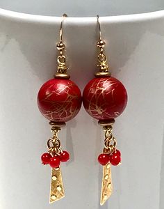 "Vintage Japanese Cherry Red Gold Drizzle Lucite Beads, Vintage Japanese Red Beads, Vintage German Gold Glass Spacer Beads, Vintage Gold Plated Triangular Dangles Raised Dots, Gold Plated French Ear Wires Whimsical BOHO long dangling earrings feature bright red vintage Japanese lucite beads in two sizes combined with gold elements for sparkle. The large red bead at the top is approximately 5/8\" in diameter with gold drizzle - each bead is different in terms of the pattern of gold. This vintage Gold Triangle, Red Beads, Long Dangle Earrings, Red Vintage, Beaded Dangle Earrings, Dangling Earrings, Gold Glass, Red Bead, Beaded Dangles