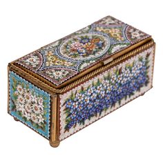 an ornately decorated box is shown on a white background