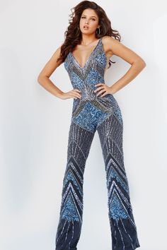 Jovani 23736 Spring 2023 evening collection dress. This luxurious dress is perfect for a black-tie event or red carpet entrance. It features an off-the-shoulder design with intricate beadwork and tulle skirt. Sequins Jumpsuit, Plus Size Sequin Dresses, Modest Formal Dresses, Luxurious Dress, Light Blue Prom Dress, Navy Blue Bridesmaid Dresses, Intricate Beading, Gold Prom Dresses, Plus Size Summer Dresses