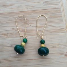 Emerald green jade Gold accent beads Gold ear wire Nickel free Gold Aventurine Beaded Jewelry, Gold Jade Jewelry With Faceted Beads, Elegant Green Beaded Earrings With Gold Beads, Elegant Jade Beaded Earrings With Round Beads, Elegant Jade Beaded Round Earrings, Elegant Jade Beaded Earrings, Gold Beaded Earrings With Natural Stones, Elegant Green Earrings With Faceted Beads, Green Drop Earrings With Gold Beads